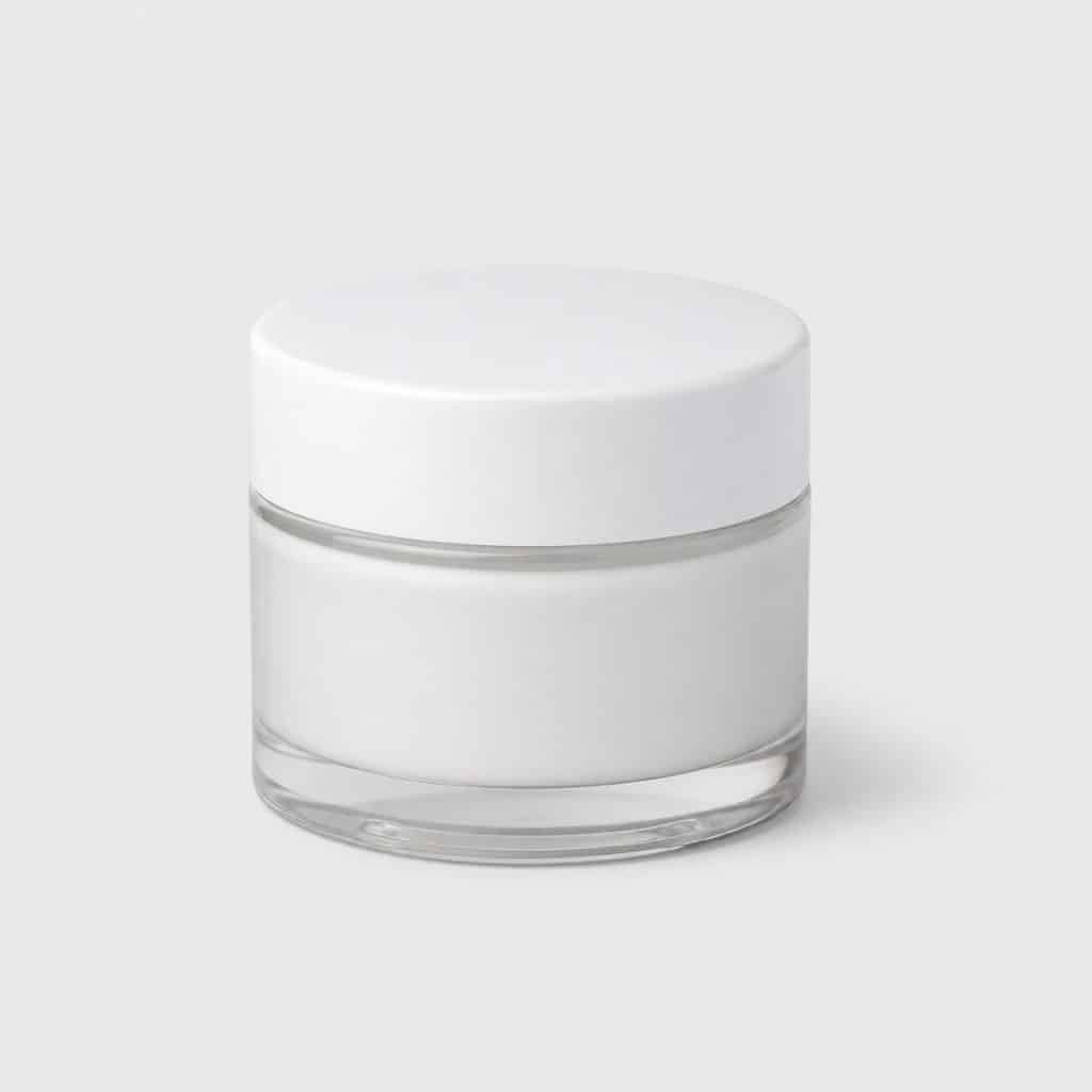 Pot de crème exfoliante douce pour texture de peau affinée